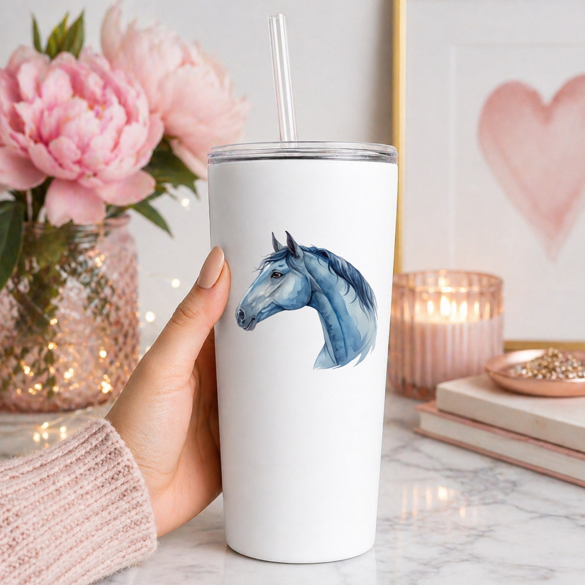 Blue Horse Head UV DTF sticker applied to a white straw tumbler beside pink peonies