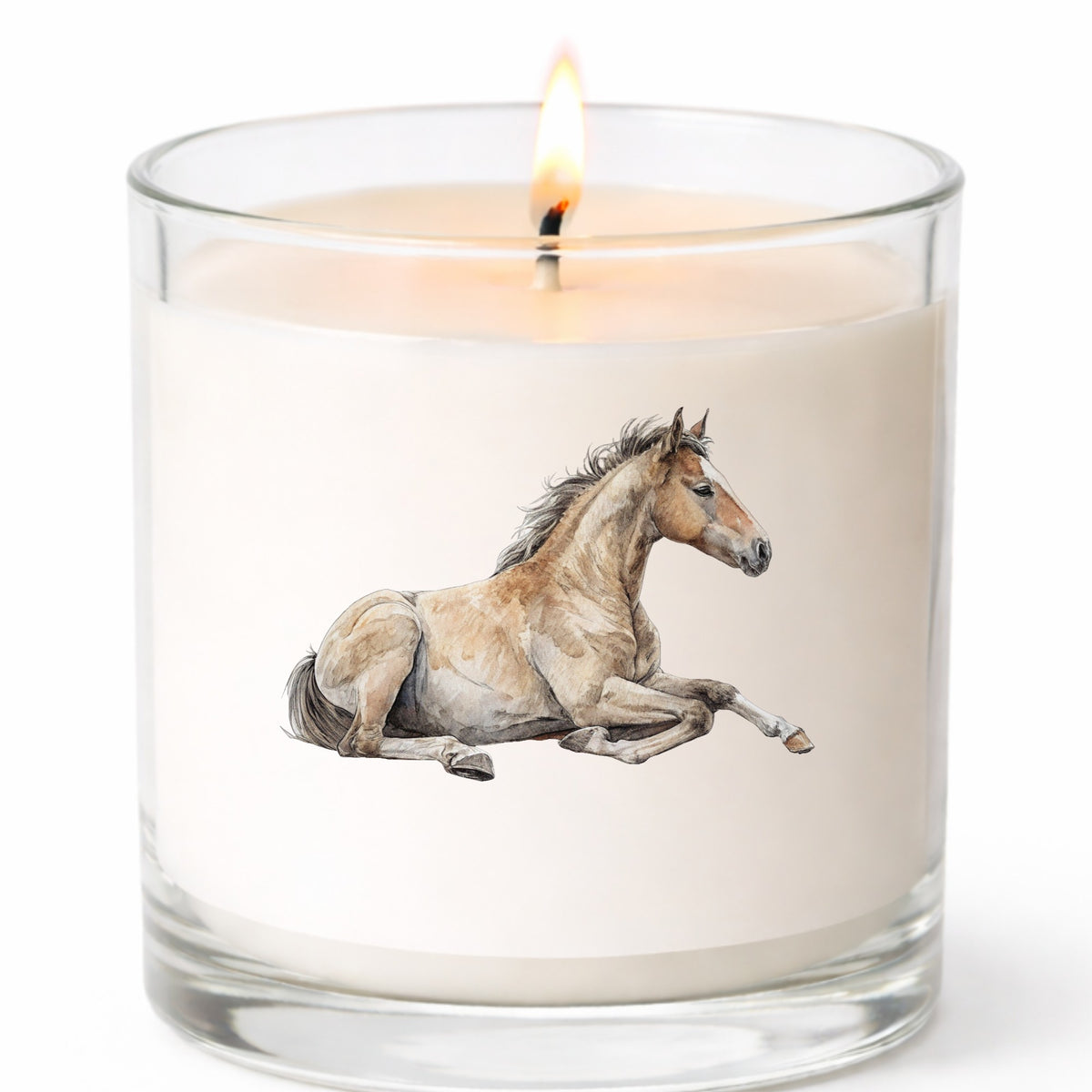 Buckskin Foal Lying Down UV DTF sticker applied to a white candle in a clear glass jar