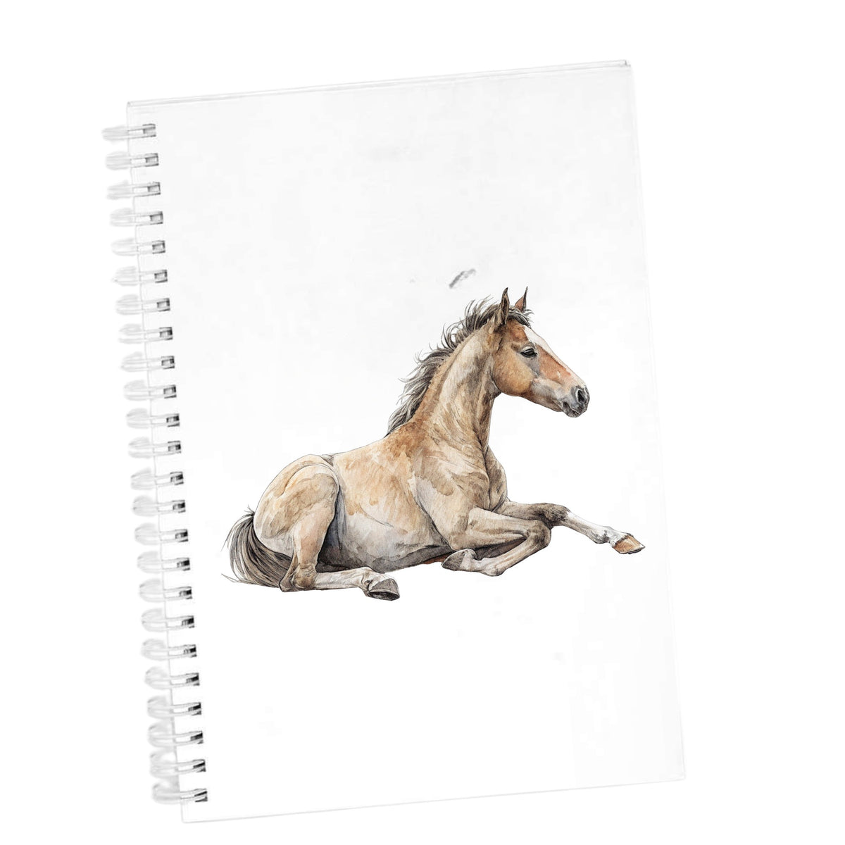 Buckskin Foal Lying Down UV DTF sticker applied to the cover of a white spiral journal