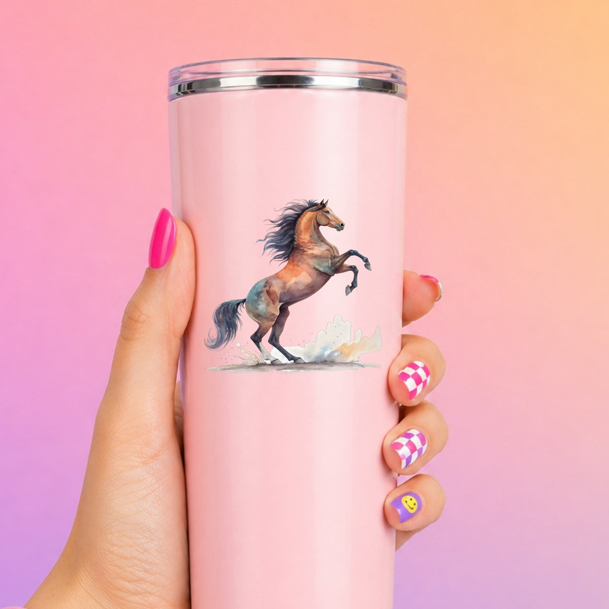 Bay Horse Rearing Up UV DTF sticker applied to a tall pink tumbler on a pink and orange background