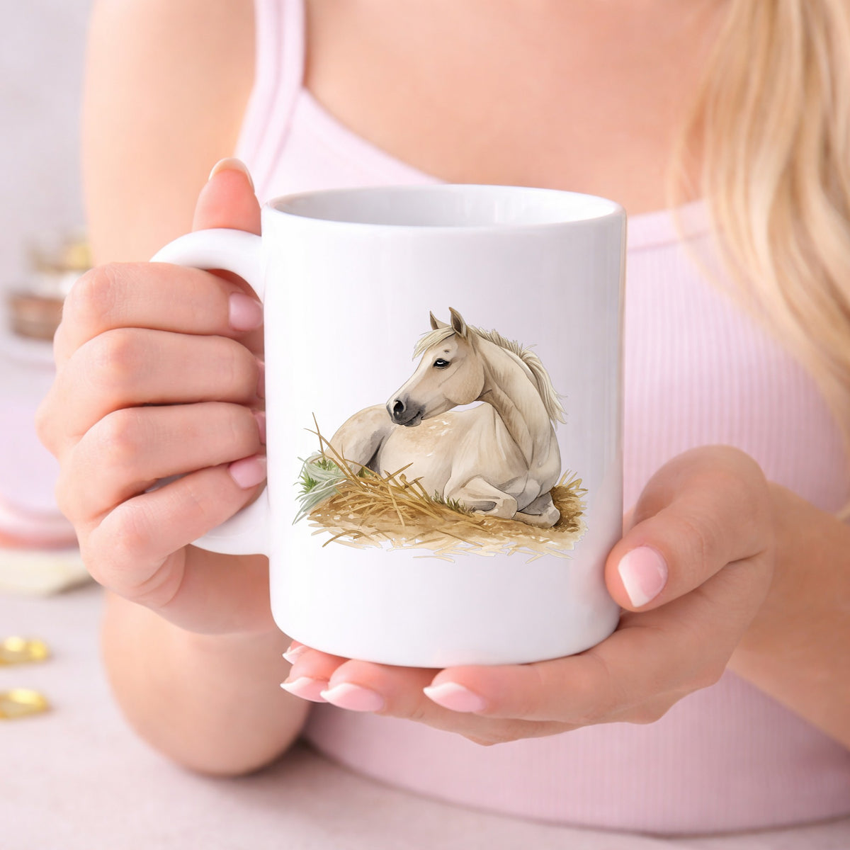 Cream Horse Resting In Hay UV DTF sticker applied to a white coffee mug held in both hands