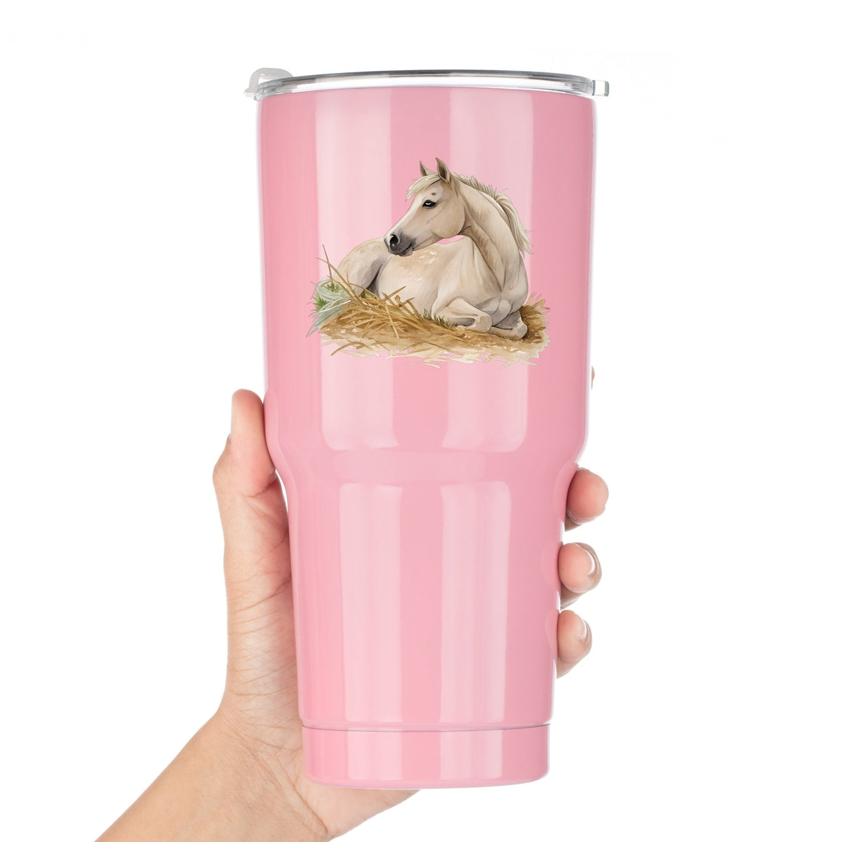 Cream Horse Resting In Hay UV DTF sticker applied to a pink tumbler held against a white background