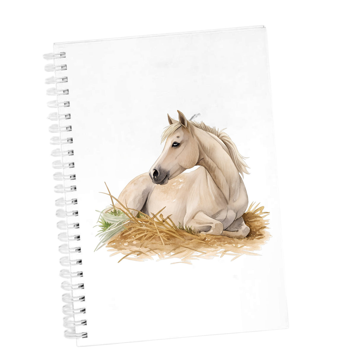 Cream Horse Resting In Hay UV DTF sticker applied to the cover of a white spiral journal