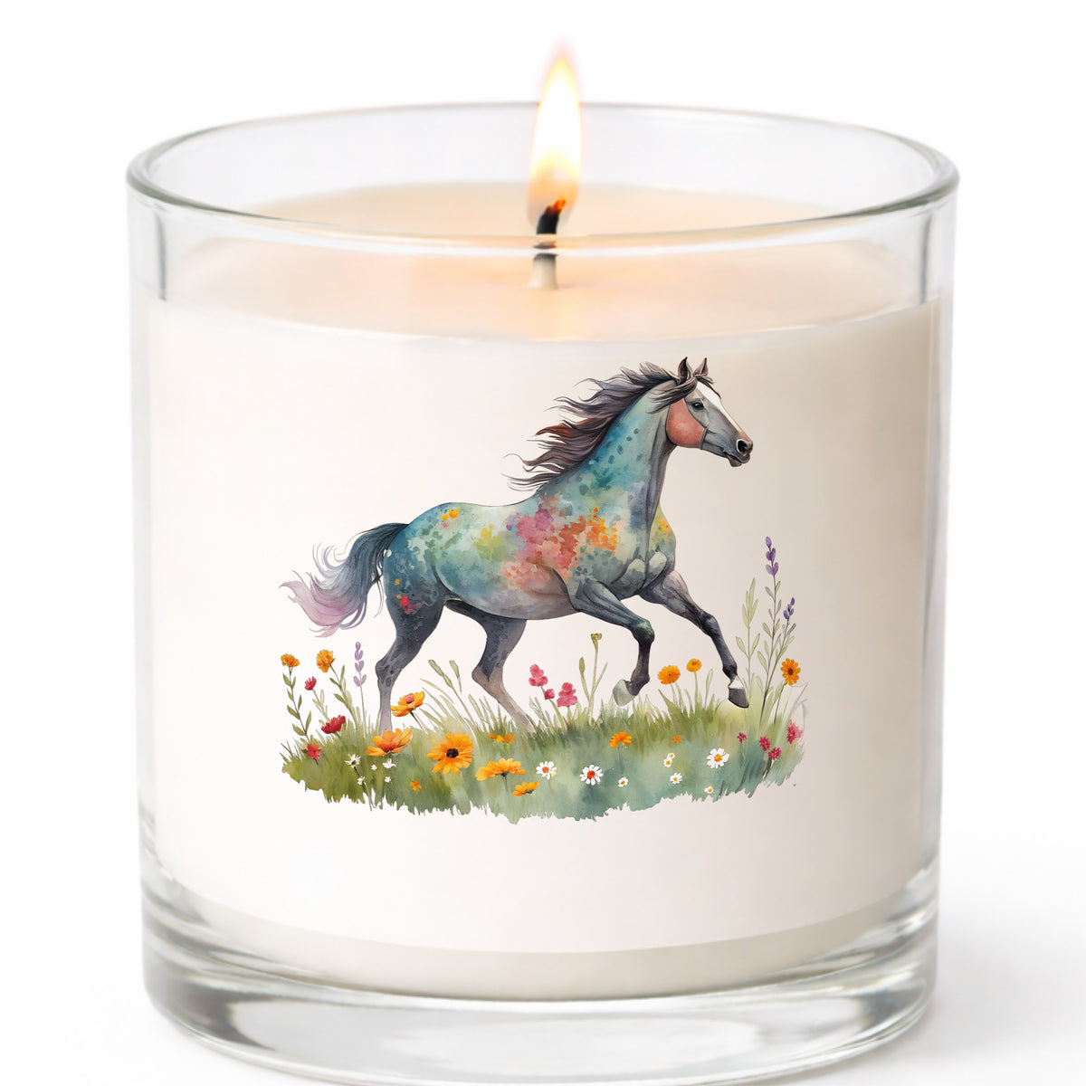 Floral Horse Running Through Wildflowers UV DTF sticker applied to a white candle in a clear glass jar