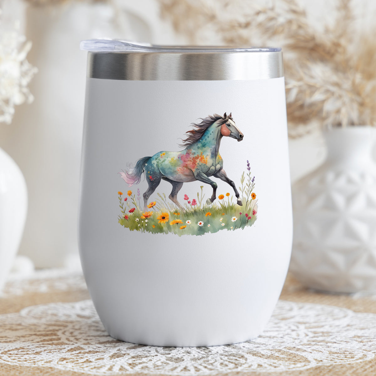 Floral Horse Running Through Wildflowers UV DTF sticker applied to a white stemless tumbler with a lid