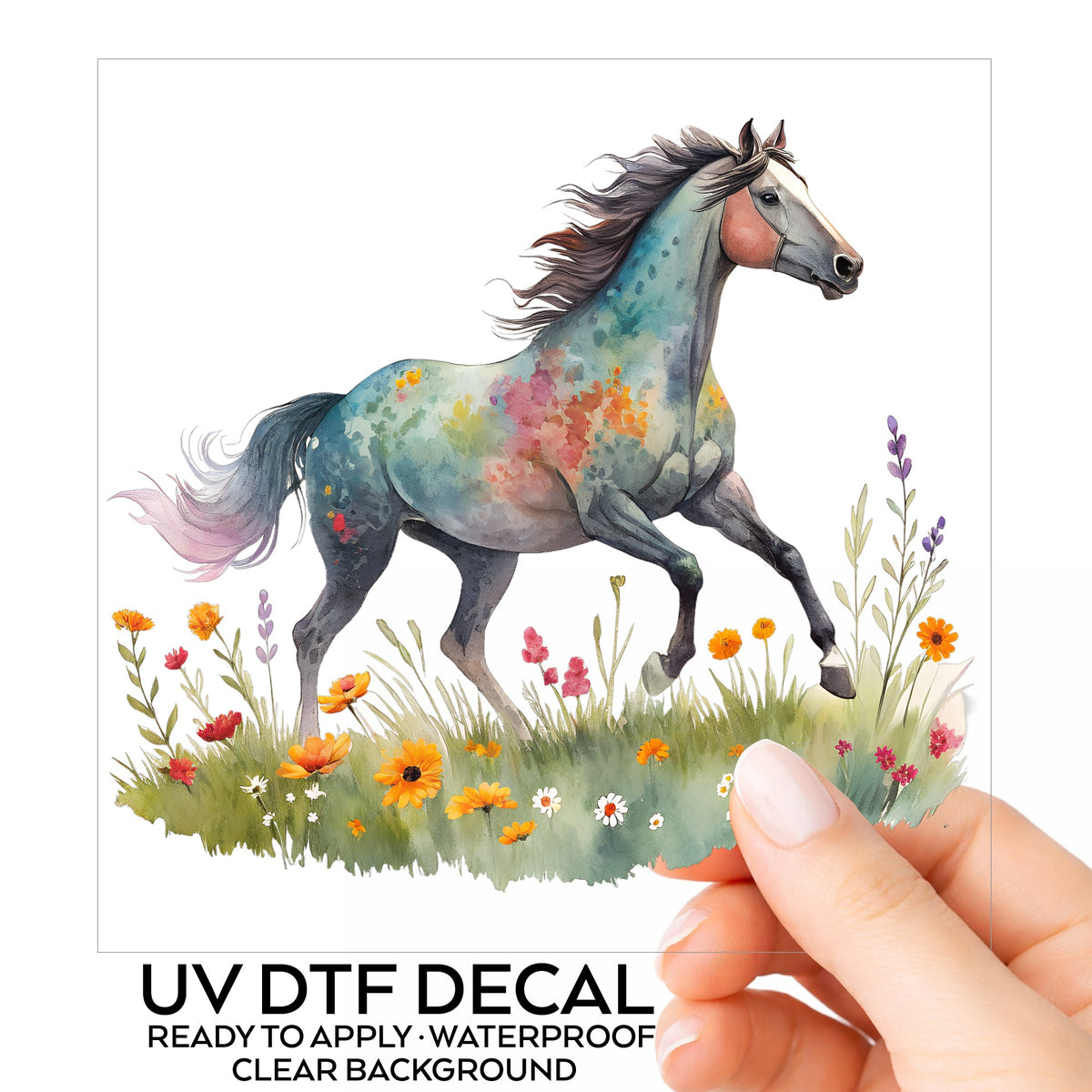 Floral Horse Running Through Wildflowers UV DTF sticker on its backing card, held in hand