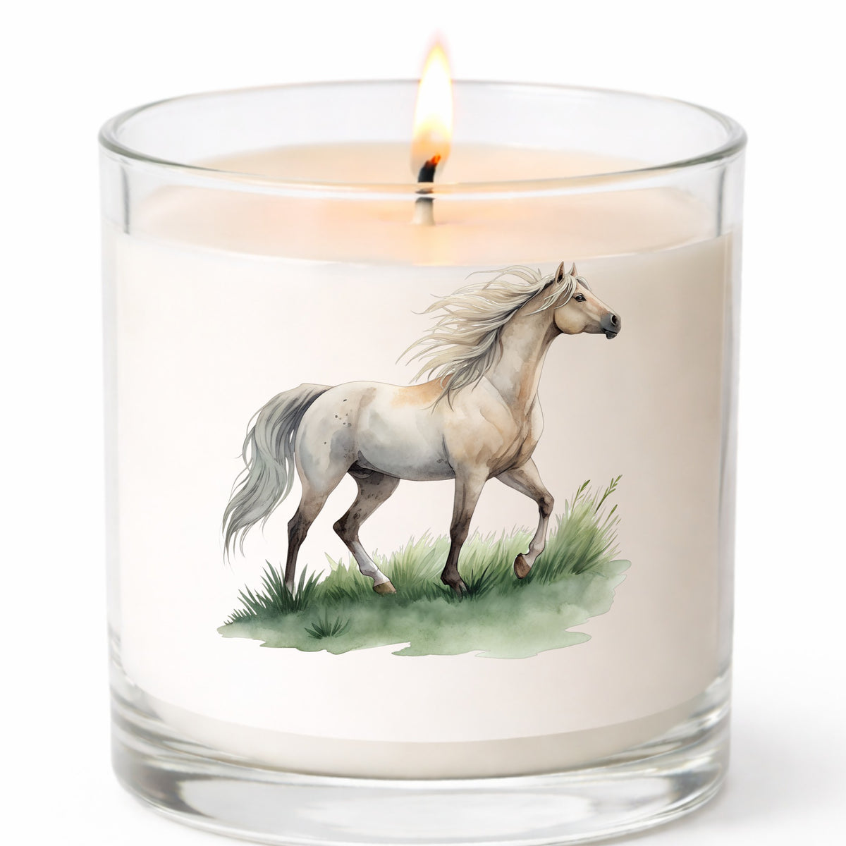 Cream Horse Trotting On Grass UV DTF sticker applied to a white candle in a clear glass jar
