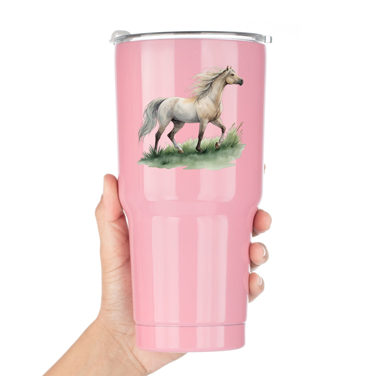 Cream Horse Trotting On Grass UV DTF sticker applied to a pink tumbler held against a white background