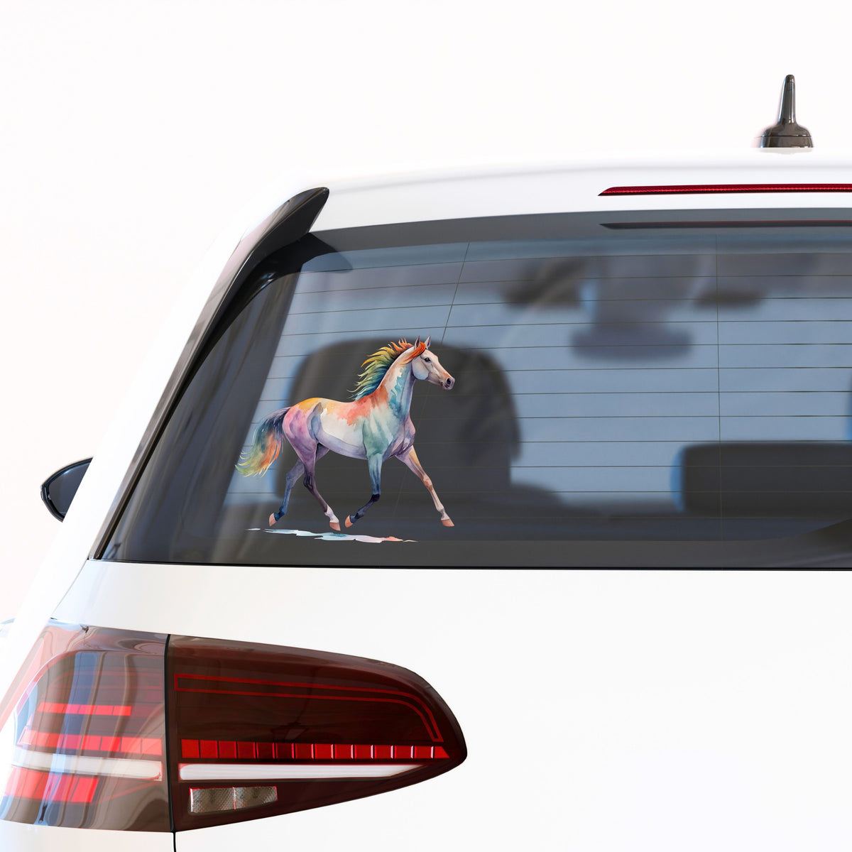 Rainbow Mane Horse Trotting UV DTF sticker applied to the rear window of a white car