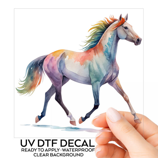 Rainbow Mane Horse Trotting UV DTF sticker on its backing card, held in hand