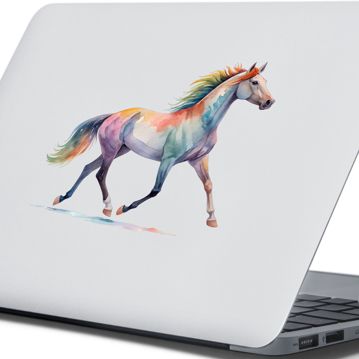 Rainbow Mane Horse Trotting UV DTF sticker applied to the lid of a silver laptop