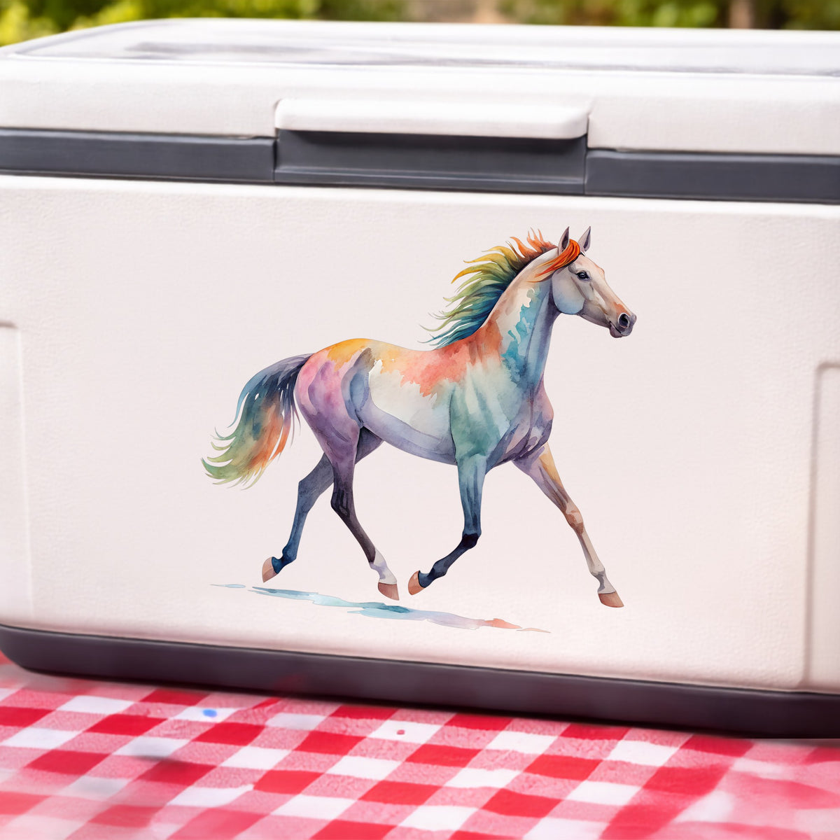 Rainbow Mane Horse Trotting UV DTF sticker applied to a white cooler on a red gingham cloth