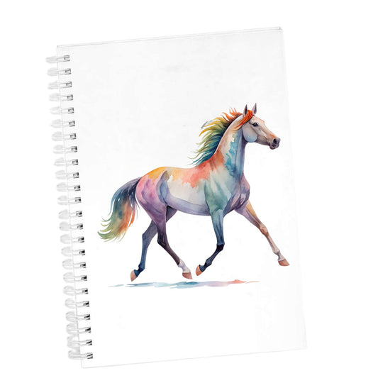 Rainbow Mane Horse Trotting UV DTF sticker applied to the cover of a white spiral journal