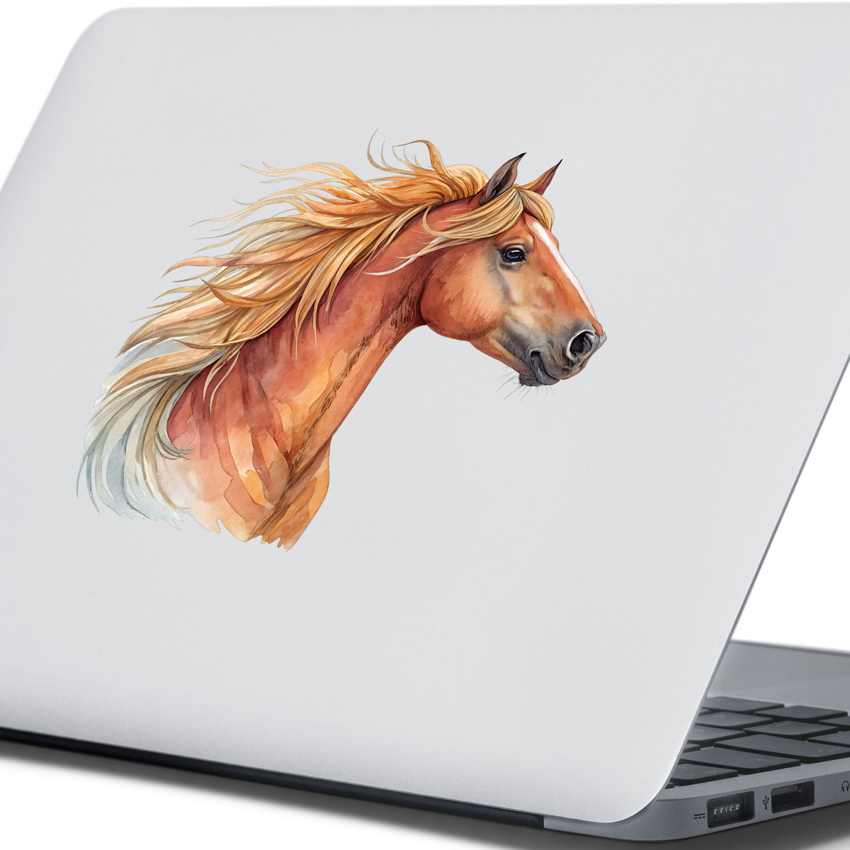 Chestnut Horse Head Golden Mane UV DTF sticker applied to the lid of a silver laptop