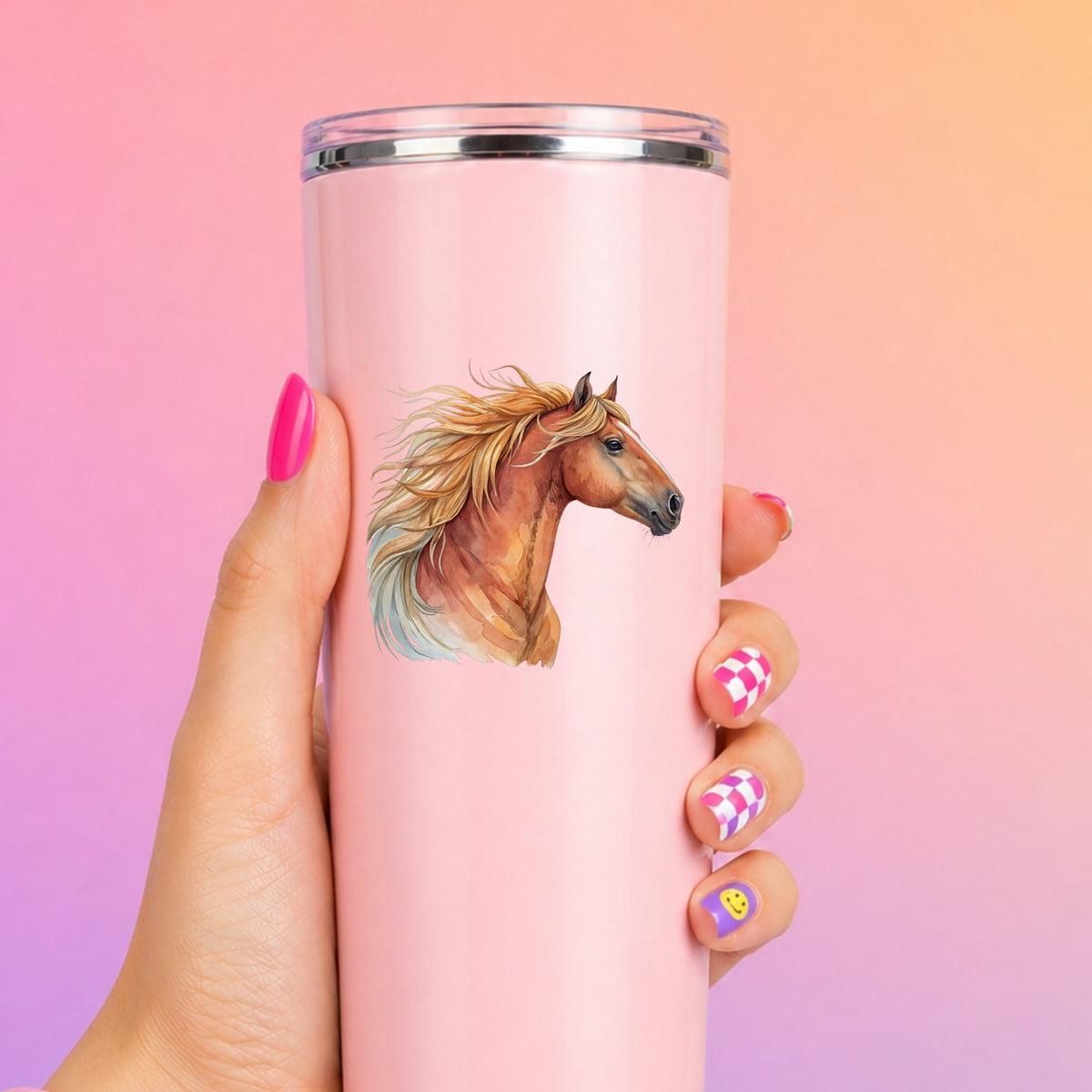 Chestnut Horse Head Golden Mane UV DTF sticker applied to a tall pink tumbler on a pink and orange background