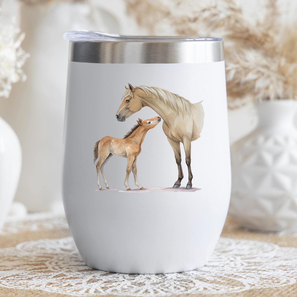 Mare Nuzzling Foal UV DTF sticker applied to a white stemless tumbler with a lid