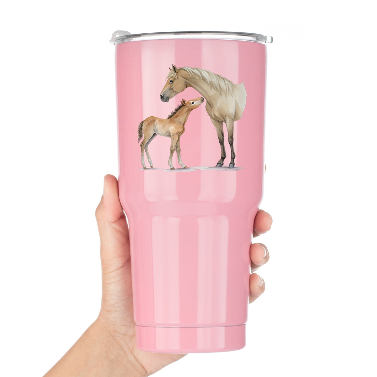 Mare Nuzzling Foal UV DTF sticker applied to a pink tumbler held against a white background
