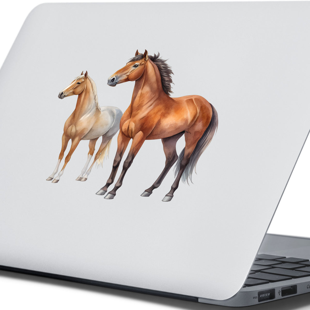 Pair Of Standing Horses Bay And Chestnut UV DTF sticker applied to the lid of a silver laptop