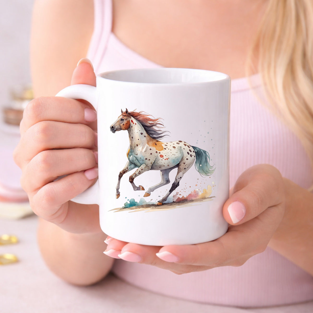 Appaloosa Spotted Horse Running UV DTF sticker applied to a white coffee mug held in both hands