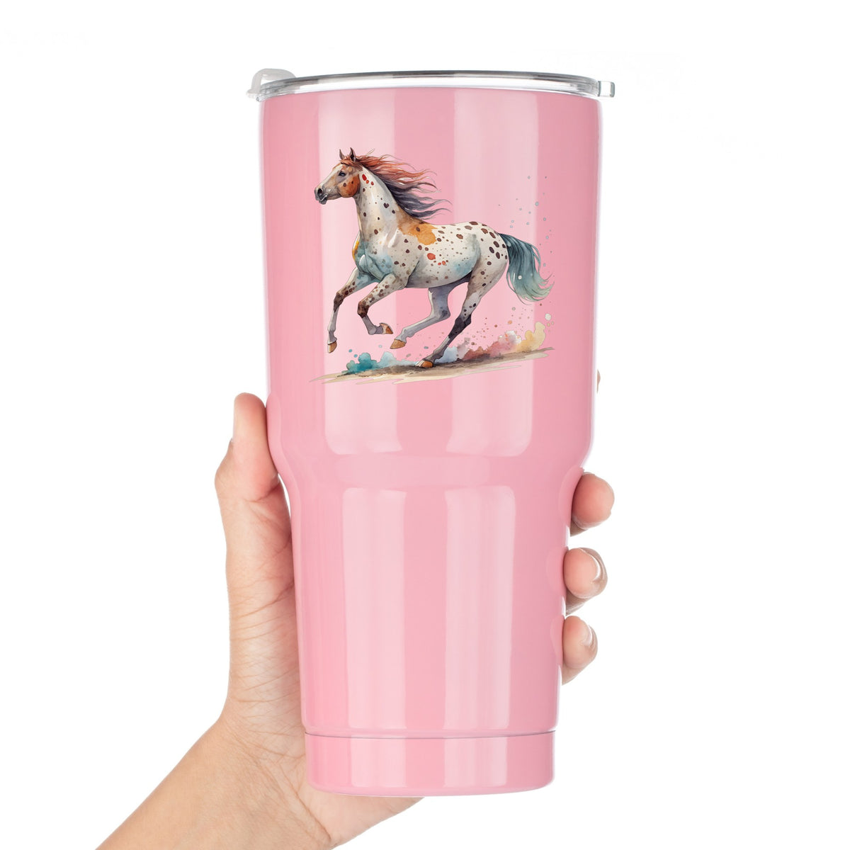 Appaloosa Spotted Horse Running UV DTF sticker applied to a pink tumbler held against a white background