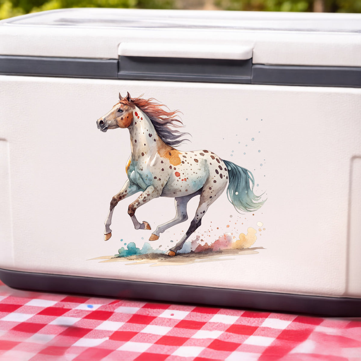Appaloosa Spotted Horse Running UV DTF sticker applied to a white cooler on a red gingham cloth