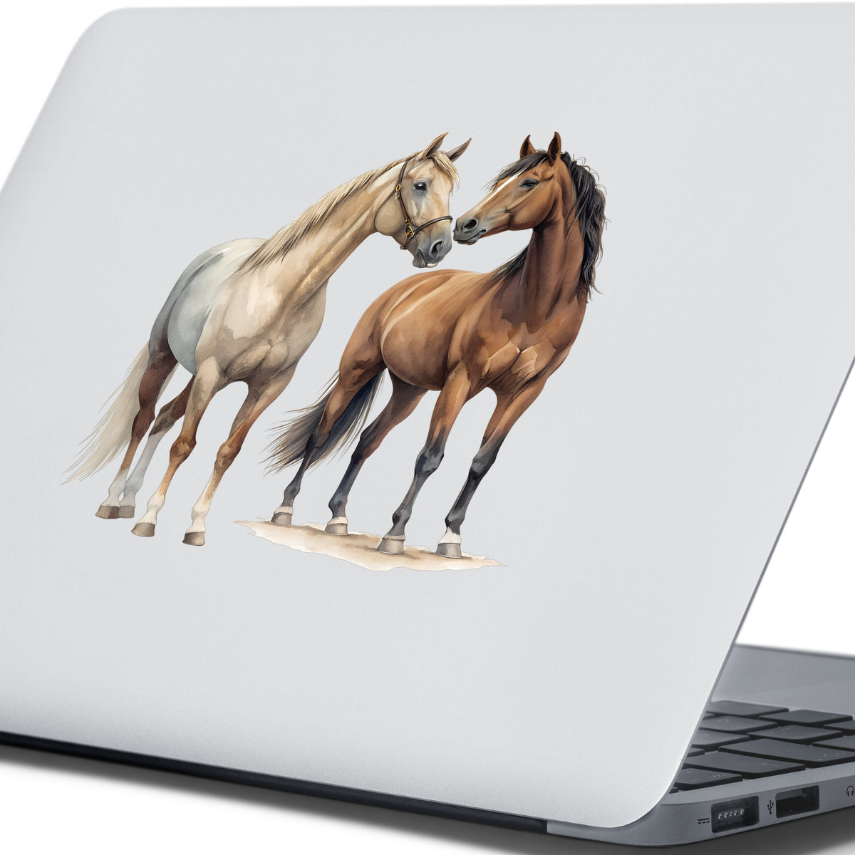 Two Horses Touching Noses UV DTF sticker applied to the lid of a silver laptop