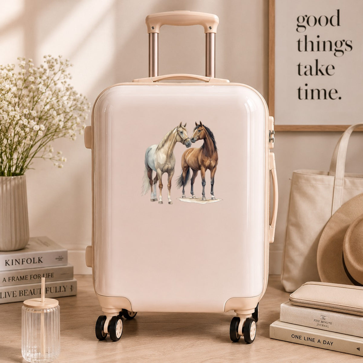 Two Horses Touching Noses UV DTF sticker applied to a cream carry-on suitcase