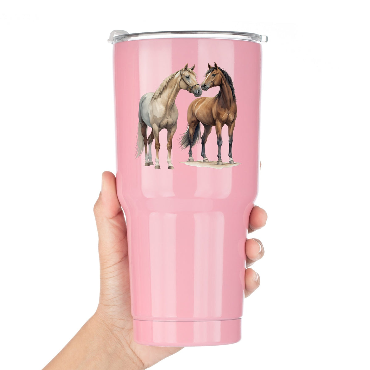 Two Horses Touching Noses UV DTF sticker applied to a pink tumbler held against a white background