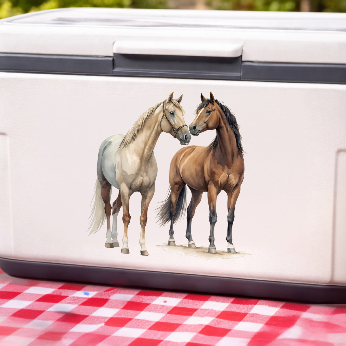 Two Horses Touching Noses UV DTF sticker applied to a white cooler on a red gingham cloth