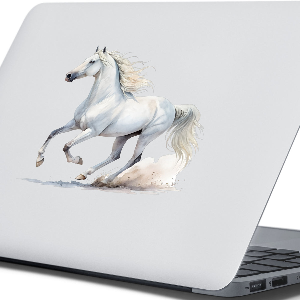 White Horse Galloping UV DTF sticker applied to the lid of a silver laptop