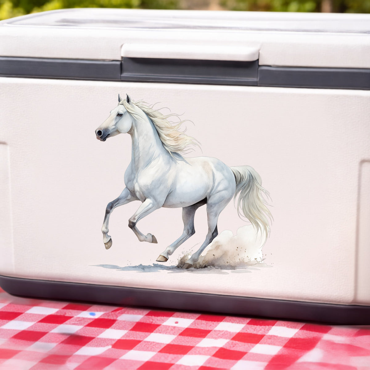 White Horse Galloping UV DTF sticker applied to a white cooler on a red gingham cloth