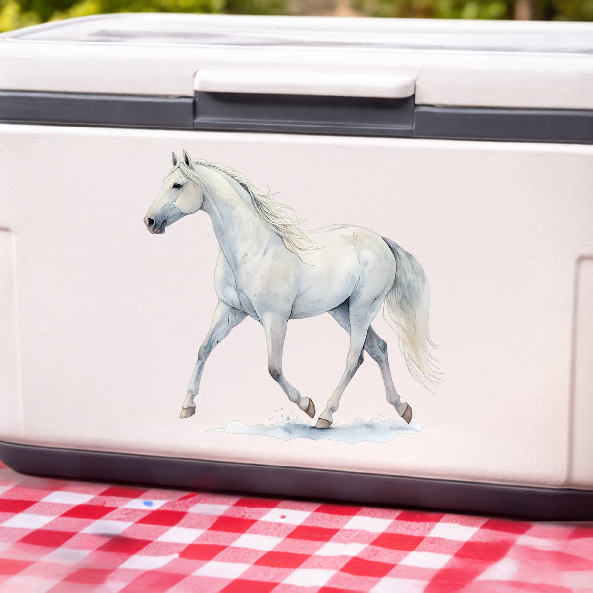 White Horse Walking UV DTF sticker applied to a white cooler on a red gingham cloth