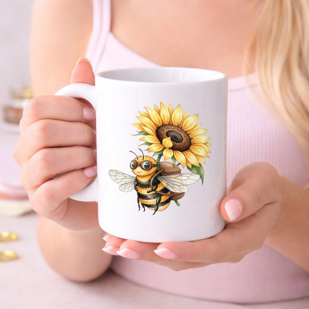 Bee Carrying Sunflower UV DTF sticker applied to a white coffee mug held in both hands