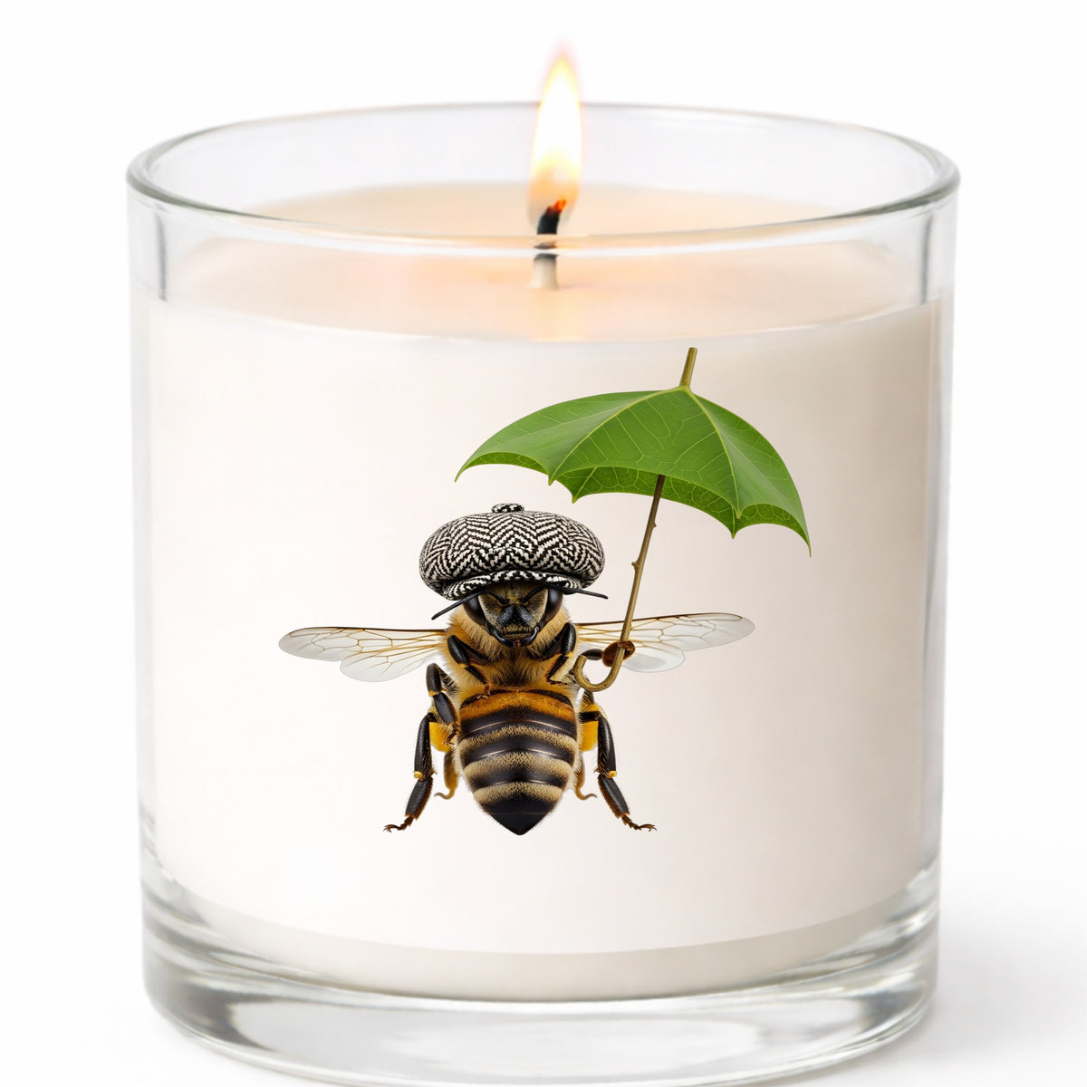 Bee In Flat Cap With Leaf Umbrella UV DTF sticker applied to a white candle in a clear glass jar
