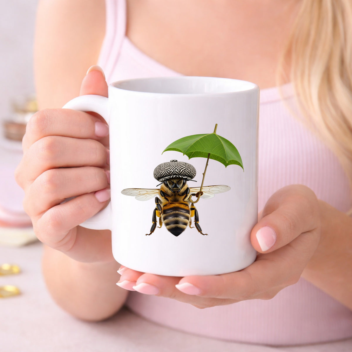 Bee In Flat Cap With Leaf Umbrella UV DTF sticker applied to a white coffee mug held in both hands