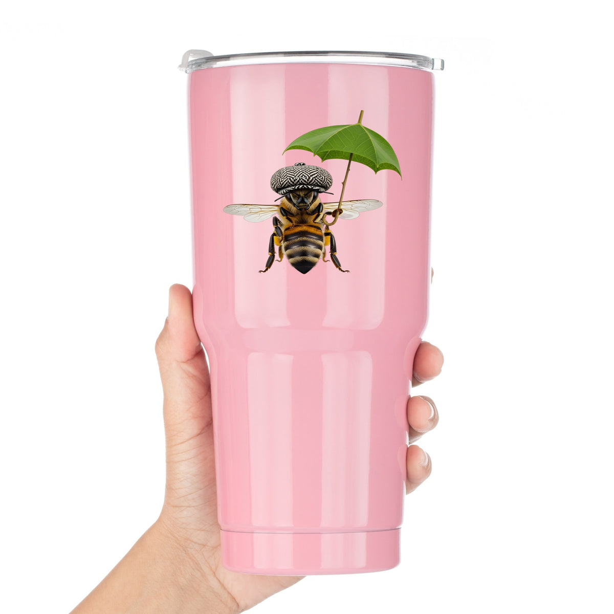 Bee In Flat Cap With Leaf Umbrella UV DTF sticker applied to a pink tumbler held against a white background