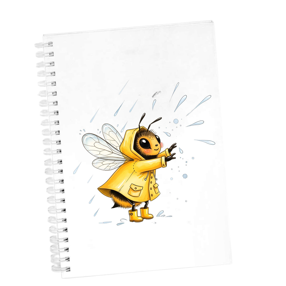 Bee In Yellow Raincoat UV DTF sticker applied to the cover of a white spiral journal