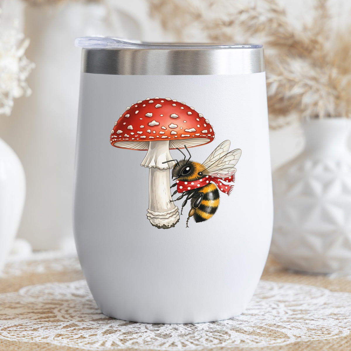 Bee With Red Mushroom UV DTF sticker applied to a white stemless tumbler with a lid