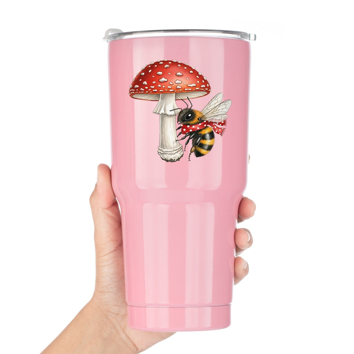 Bee With Red Mushroom UV DTF sticker applied to a pink tumbler held against a white background