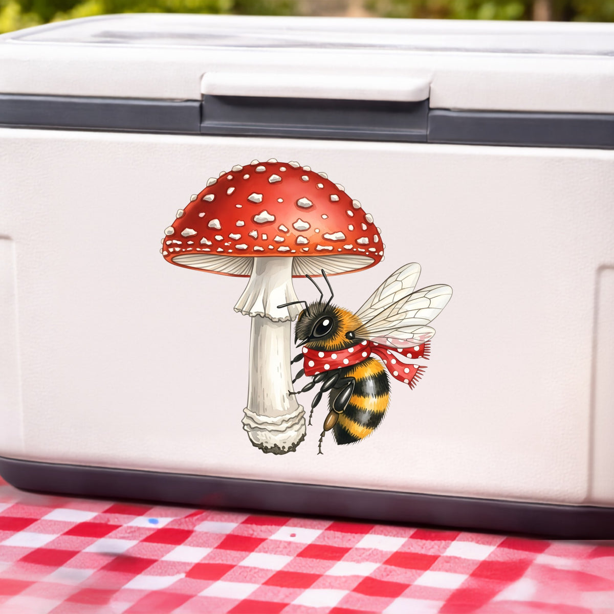 Bee With Red Mushroom UV DTF sticker applied to a white cooler on a red gingham cloth