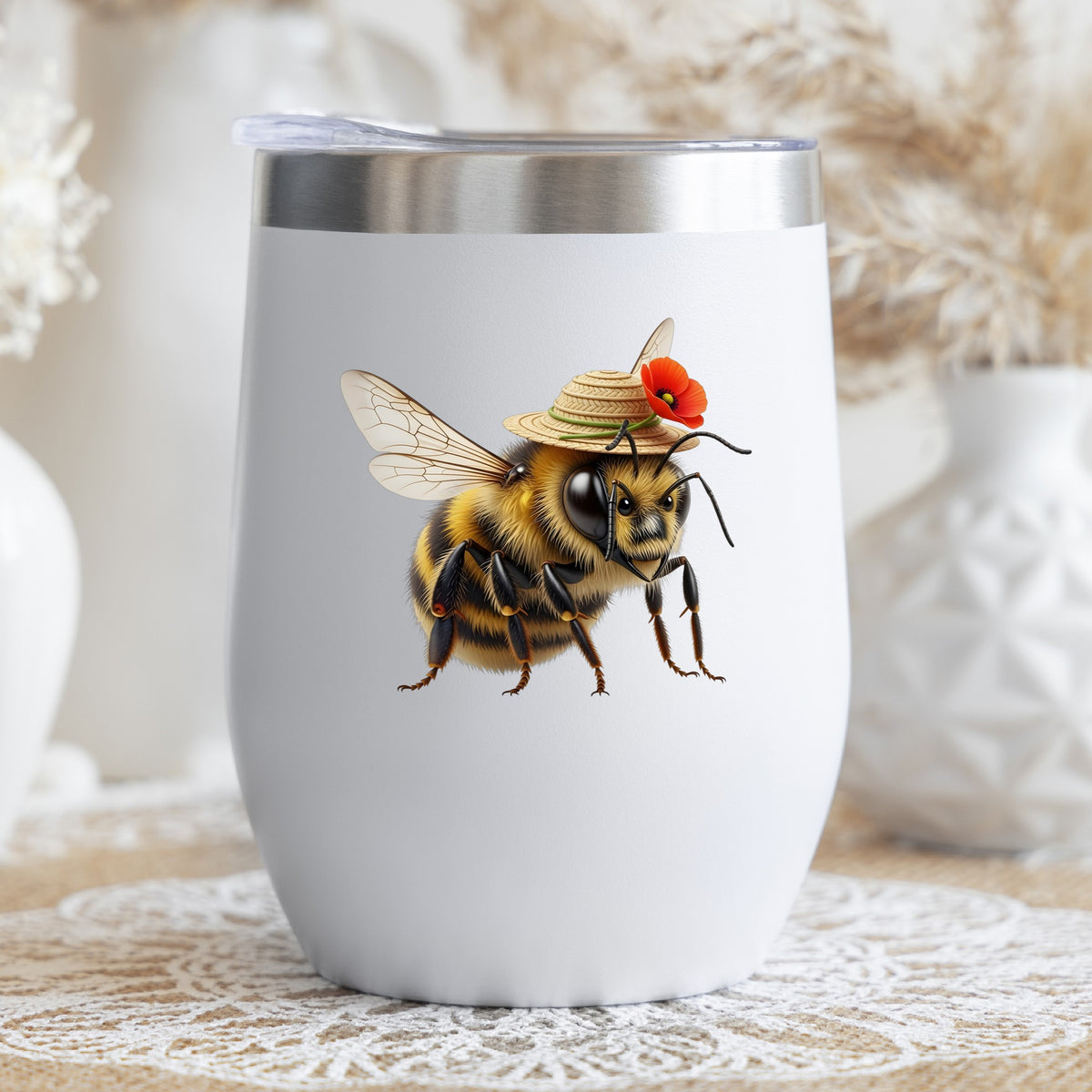 Bee In Straw Hat With Red Poppy UV DTF sticker applied to a white stemless tumbler with a lid