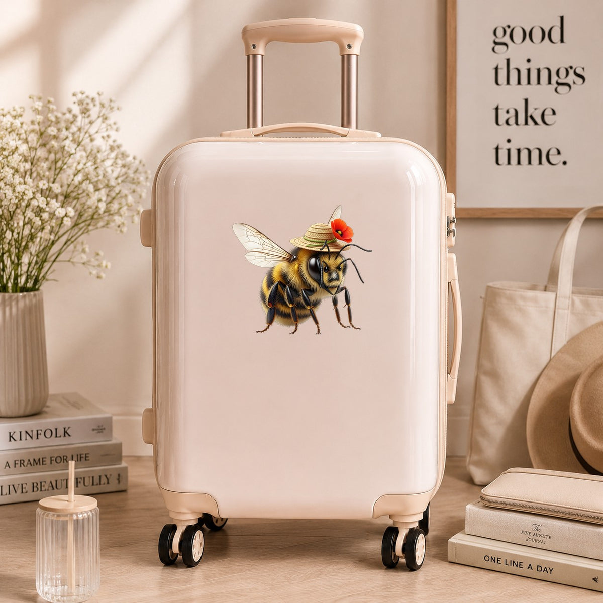 Bee In Straw Hat With Red Poppy UV DTF sticker applied to a cream carry-on suitcase