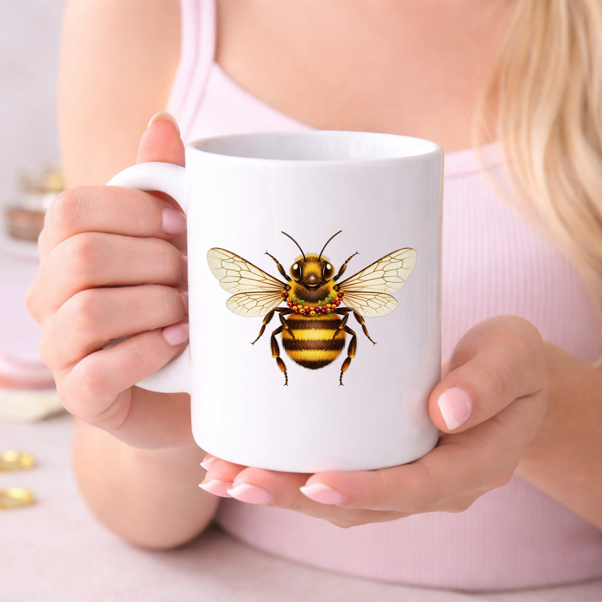 Bee With Berry Garland Necklace UV DTF sticker applied to a white coffee mug held in both hands