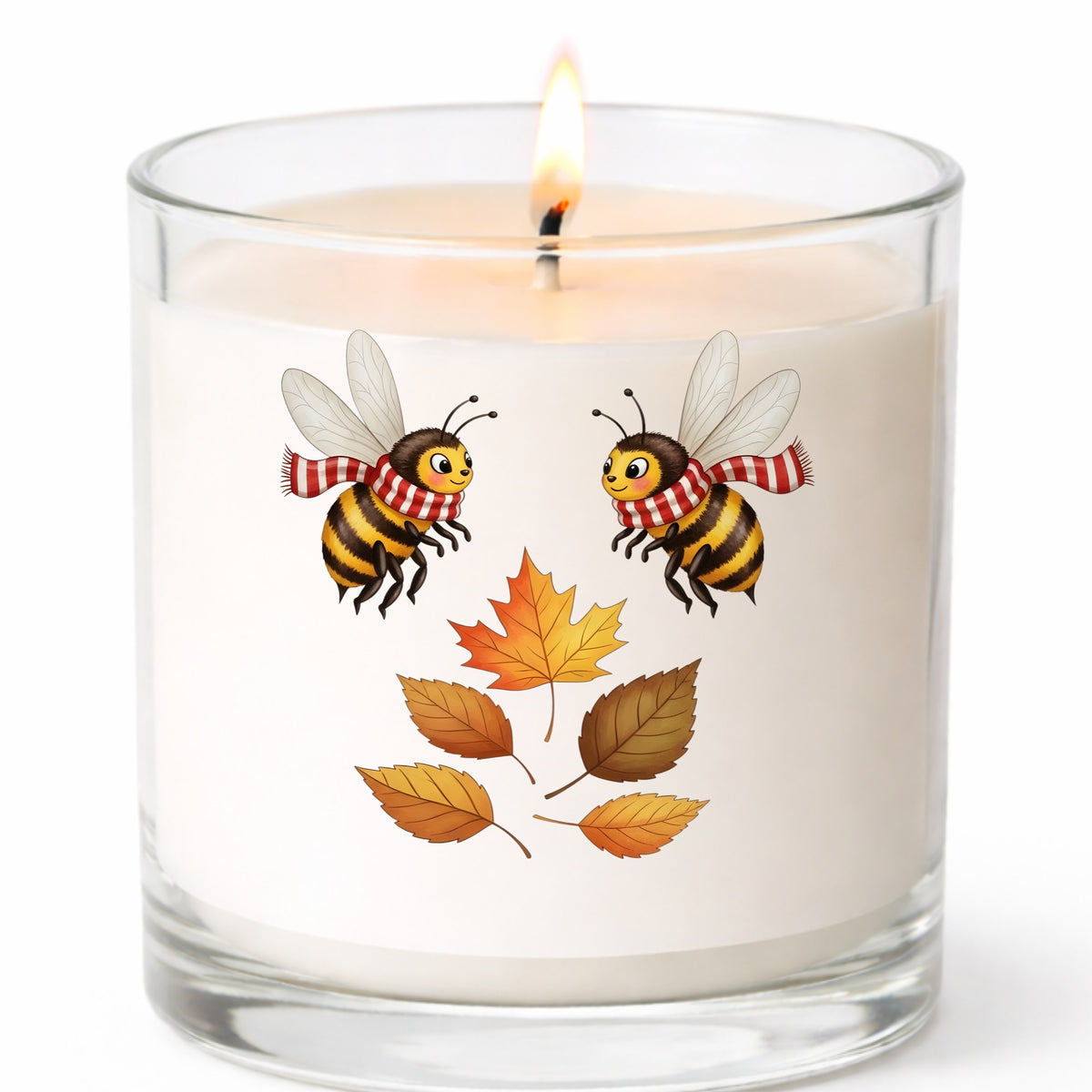 Two Bees With Autumn Leaves UV DTF sticker applied to a white candle in a clear glass jar
