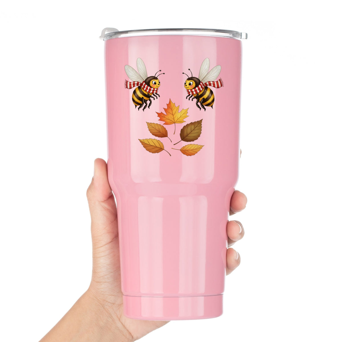 Two Bees With Autumn Leaves UV DTF sticker applied to a pink tumbler held against a white background