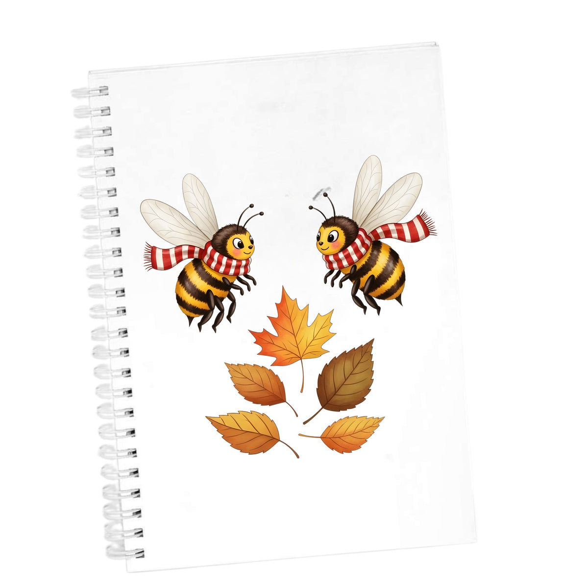 Two Bees With Autumn Leaves UV DTF sticker applied to the cover of a white spiral journal