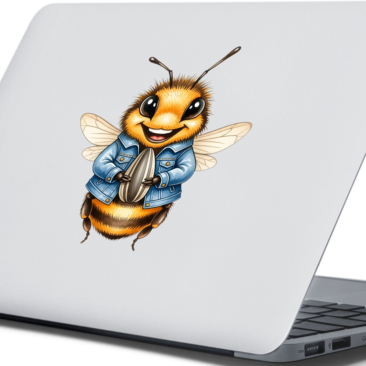 Bee In Denim Jacket With Sunflower Seed UV DTF sticker applied to the lid of a silver laptop