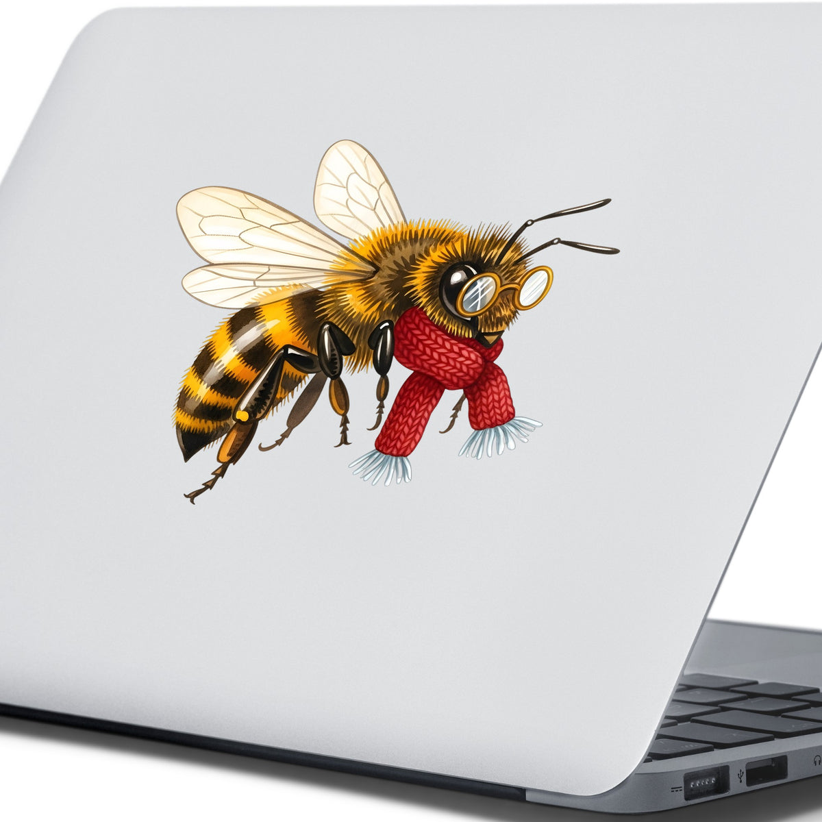 Bee With Spectacles And Red Scarf UV DTF sticker applied to the lid of a silver laptop