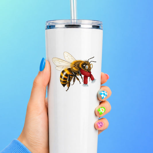 Bee With Spectacles And Red Scarf UV DTF sticker applied to a white straw tumbler on a blue background