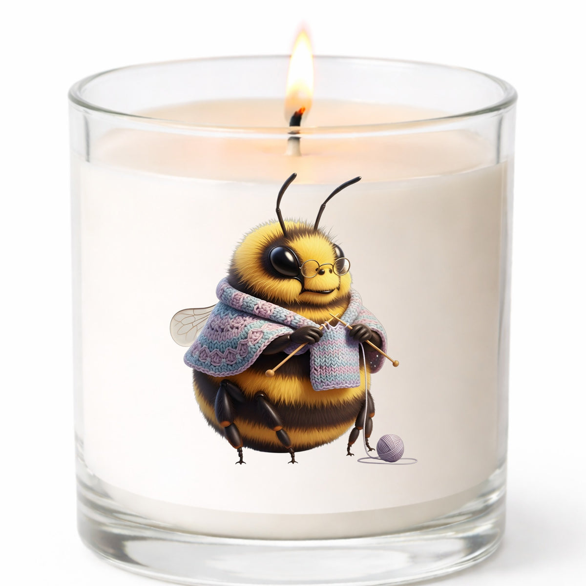 Bee Knitting In Shawl UV DTF sticker applied to a white candle in a clear glass jar